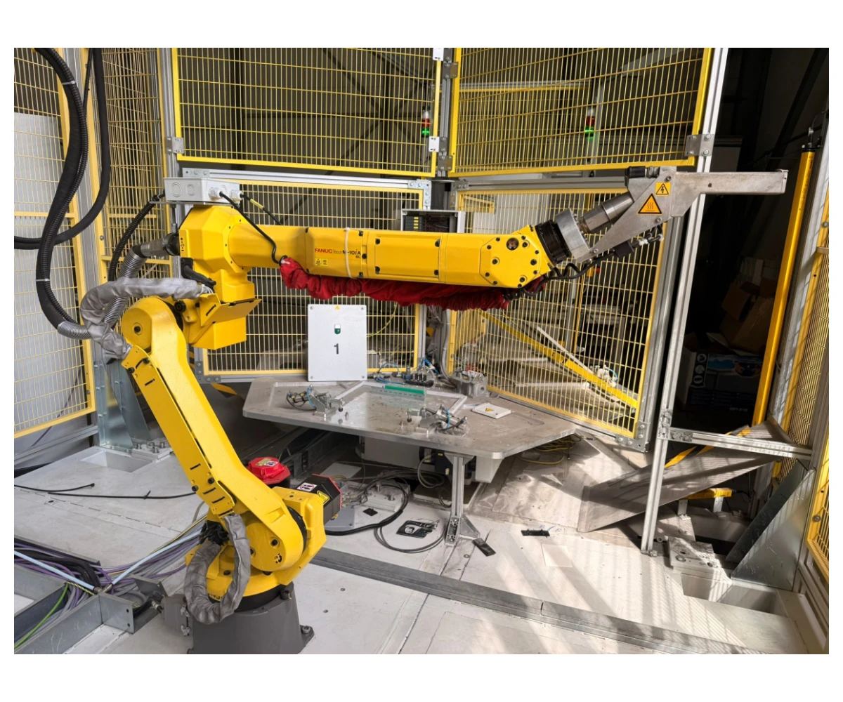 ame treatment system for plastic molded parts with FANUC M-10iA/6L