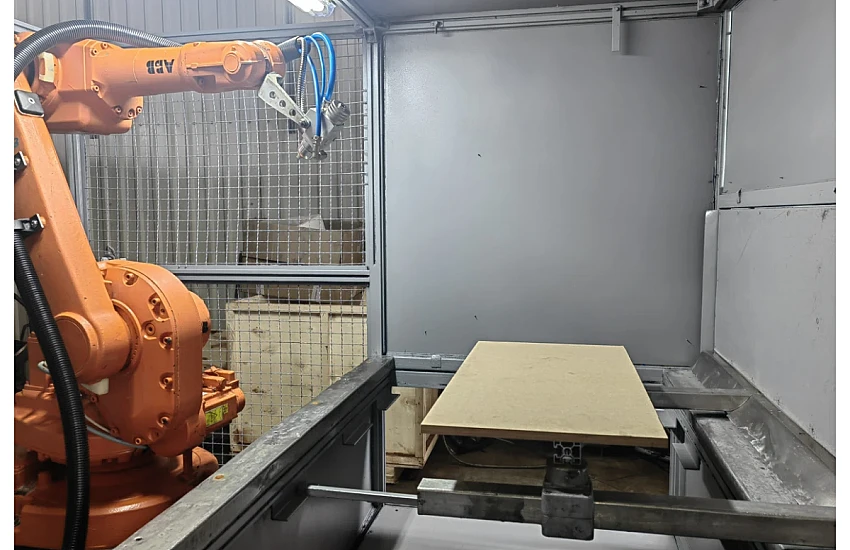 Implementation of a painting cell with an ABB robot